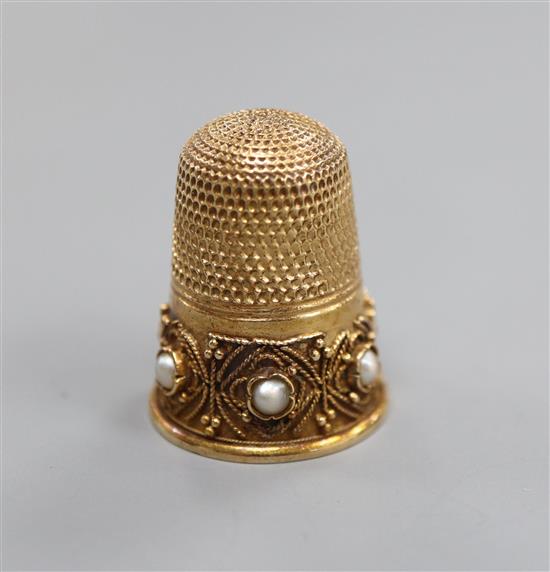 A late Victorian 15ct gold and seed pearl set thimble, with cannetile work decoration, Birmingham, 1899, in original case,